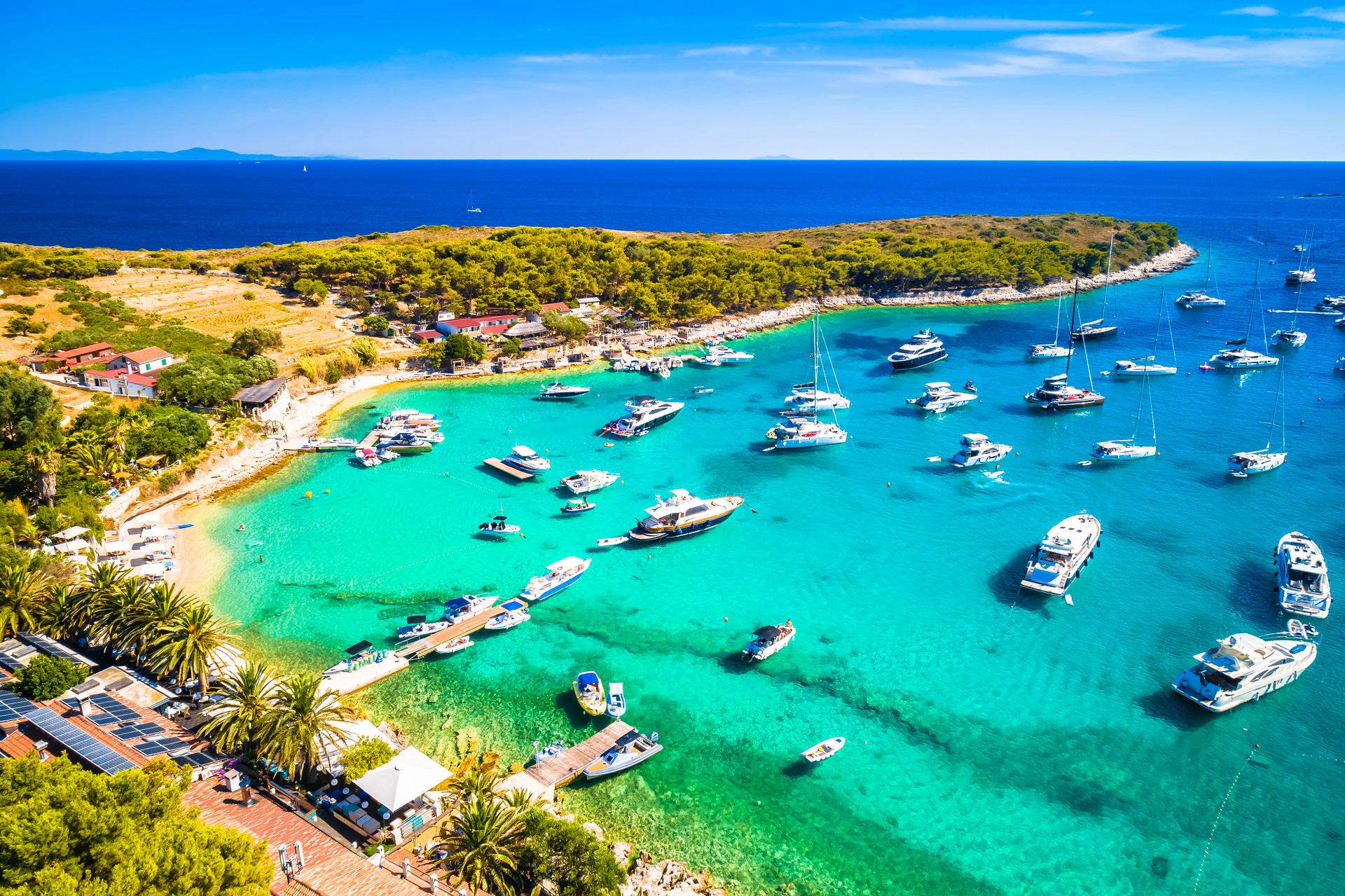 Aerial view of Palmizana bay, summer leisure sailing cove and turquoise beach on Pakleni Otoci islands